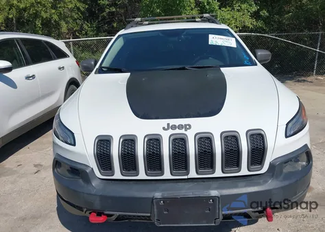 2014 Jeep Cherokee Trailhawk from USA, damaged, VIN 1C4PJMBSXEW212295